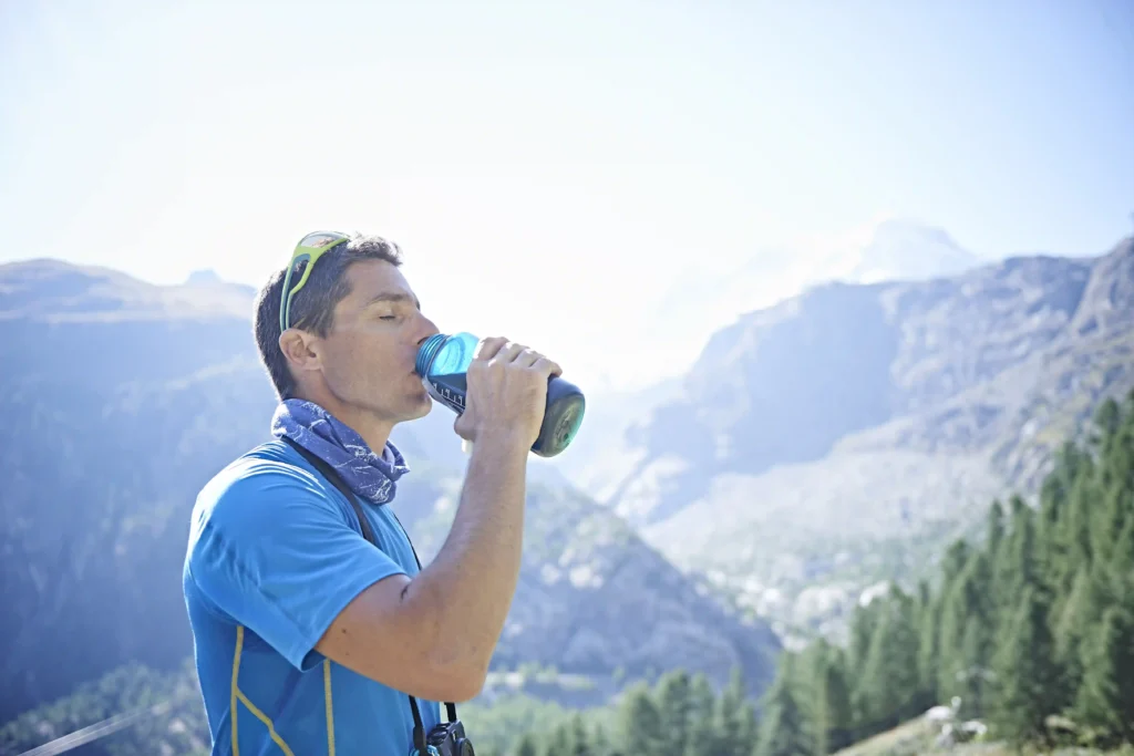 hiker drinking from water bottle mont cervin mat 2024 06 28 22 13 48 utc ezgif.com jpg to webp converter