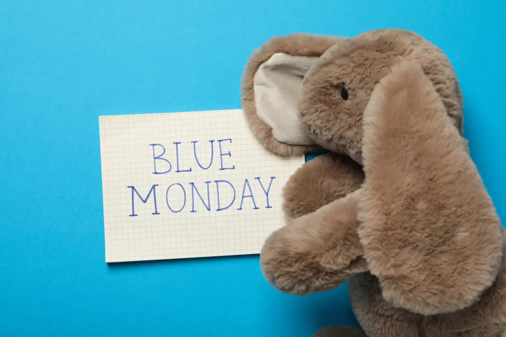paper with blue monday text and bunny on blue back